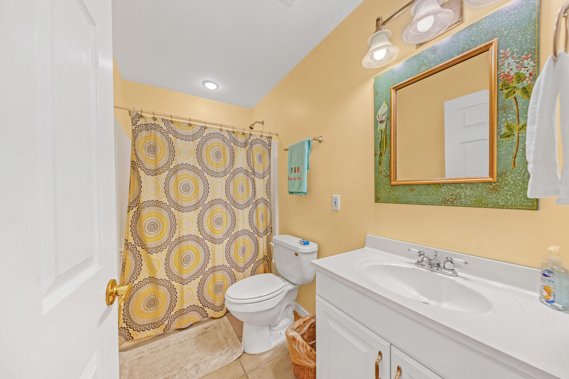 88 East Blue Crab Loop Panama City Beach, FL 32461 - Photo 20 of 55 a bathroom with a sink a toilet and a mirror