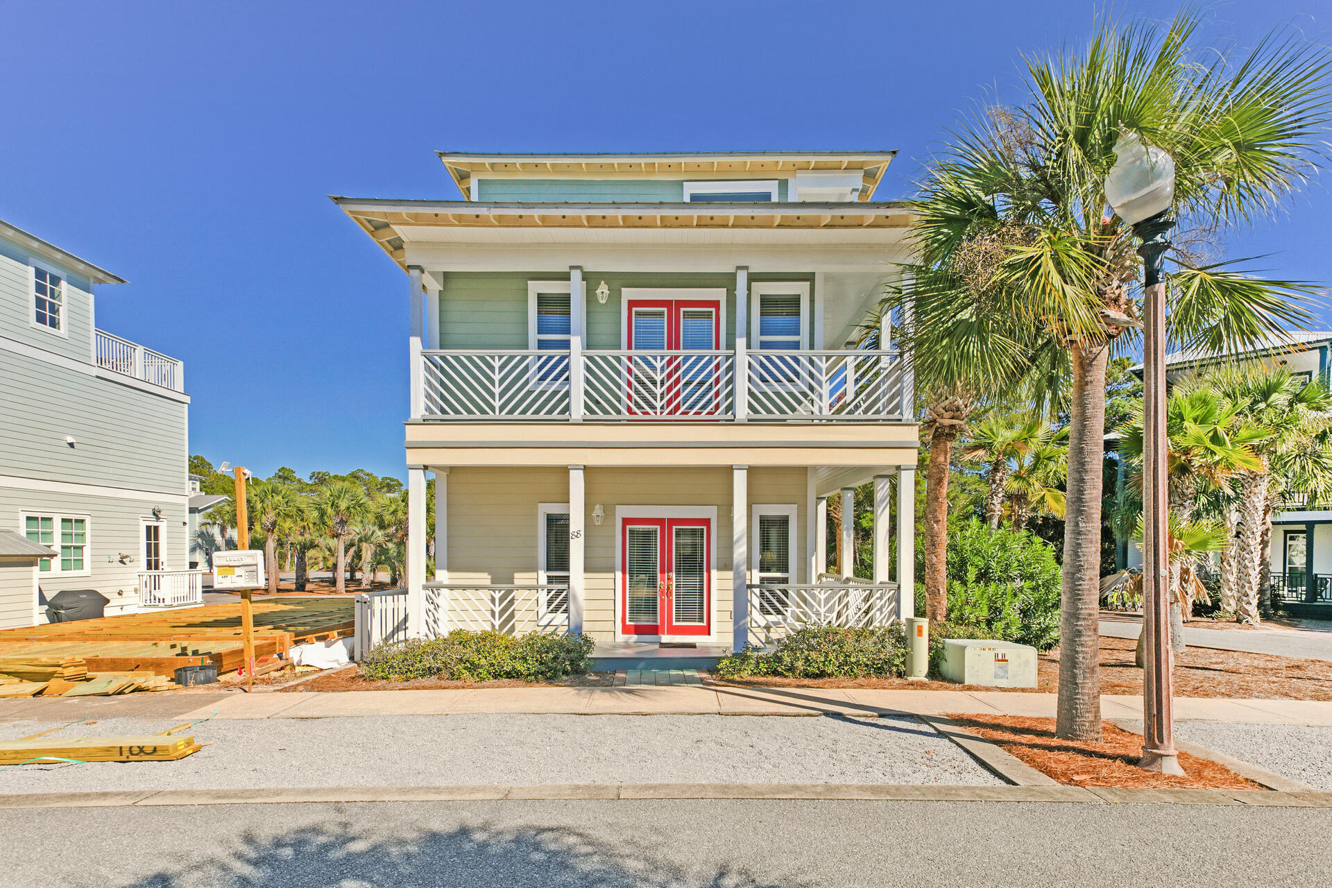 88 East Blue Crab Loop Panama City Beach, FL 32461 - Photo 2 of 55 front view of a building