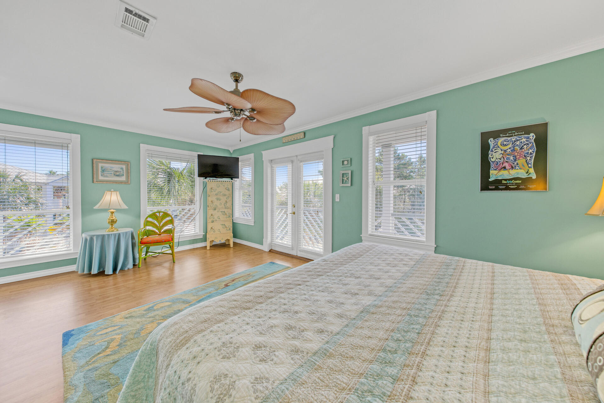 88 East Blue Crab Loop Panama City Beach, FL 32461 - Photo 23 of 55 a bedroom with a large bed and a large window