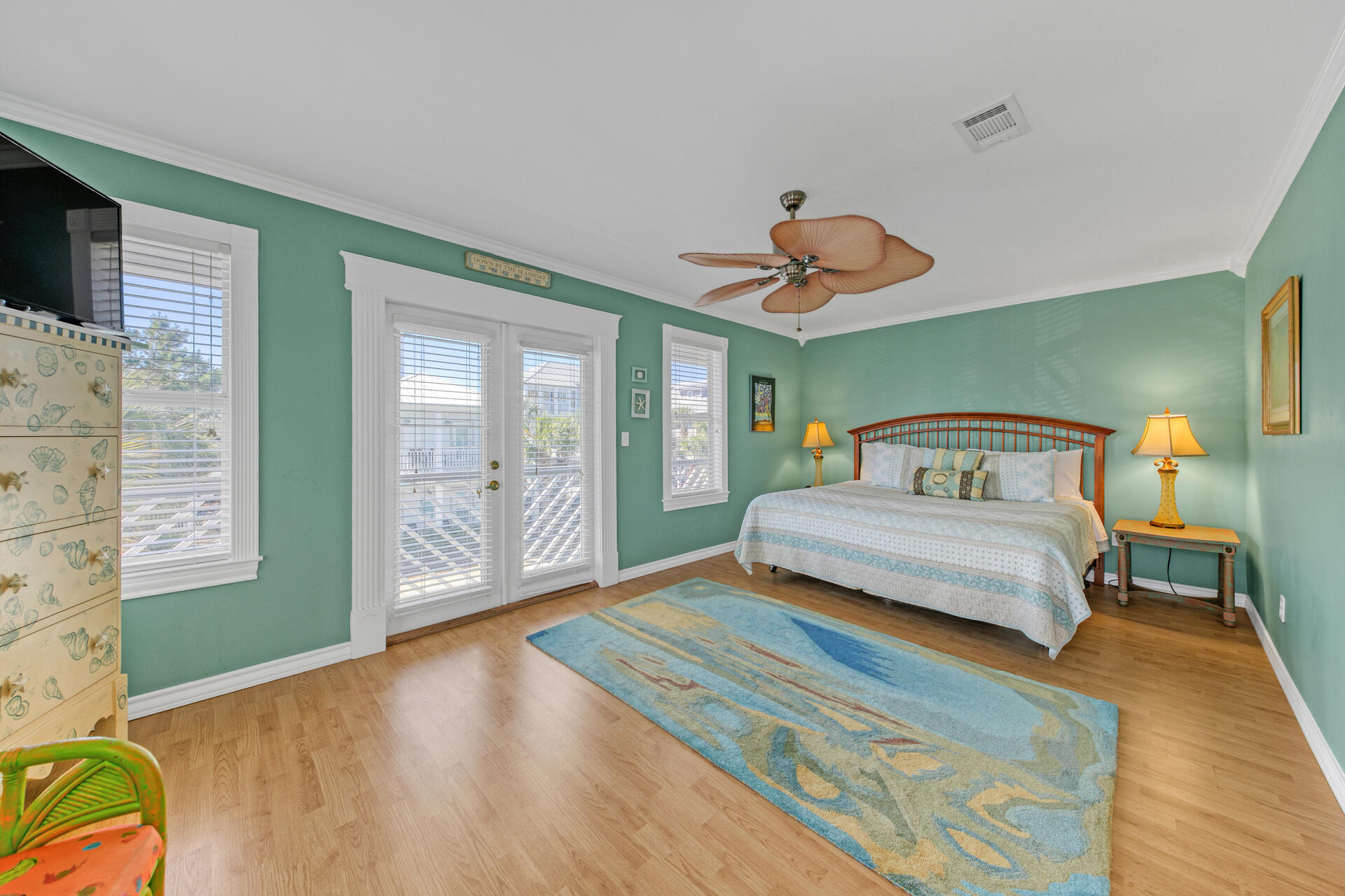 88 East Blue Crab Loop Panama City Beach, FL 32461 - Photo 24 of 55 a bedroom with a bed and window