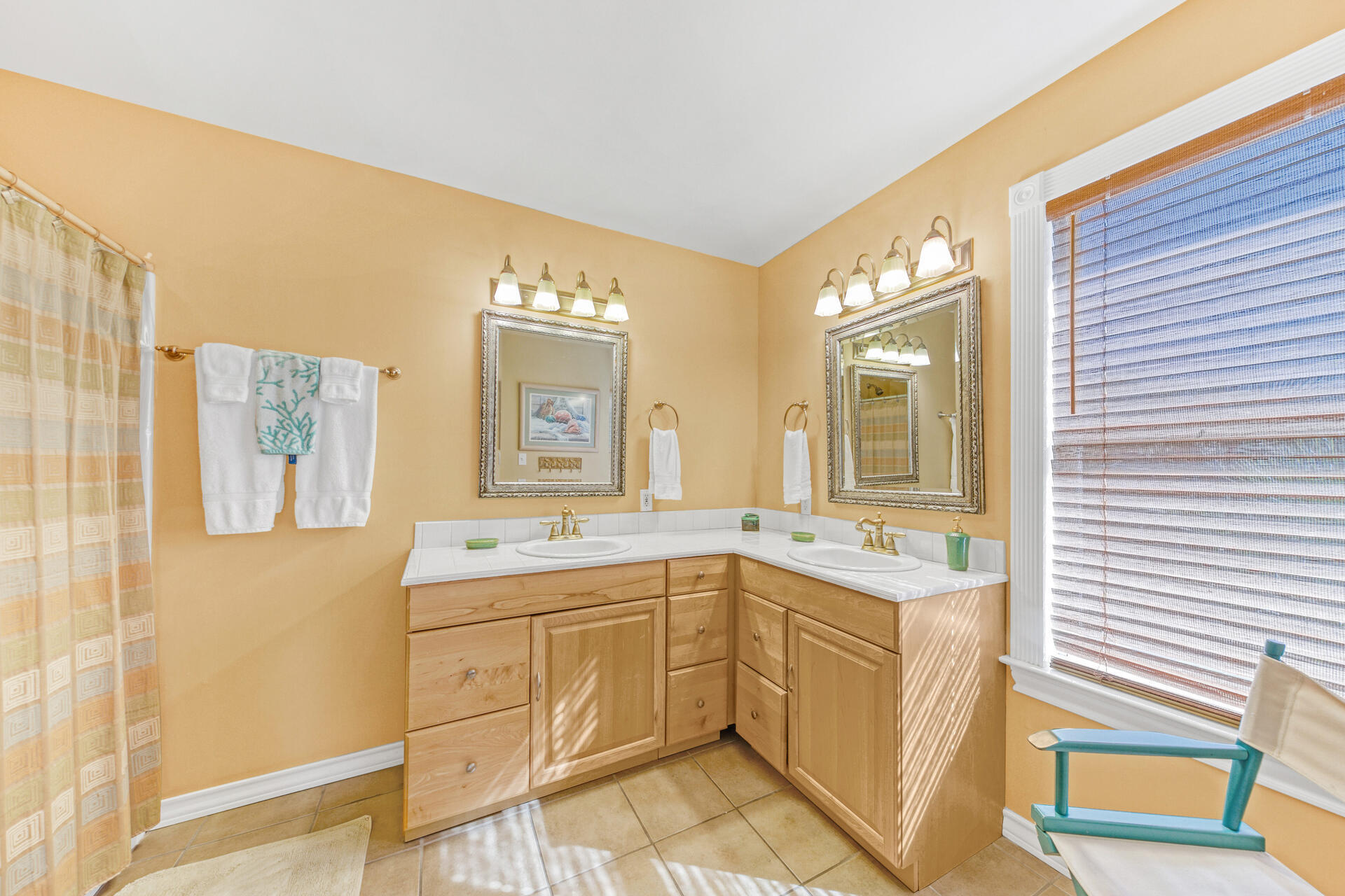 88 East Blue Crab Loop Panama City Beach, FL 32461 - Photo 25 of 55 a bathroom with a sink and a mirror
