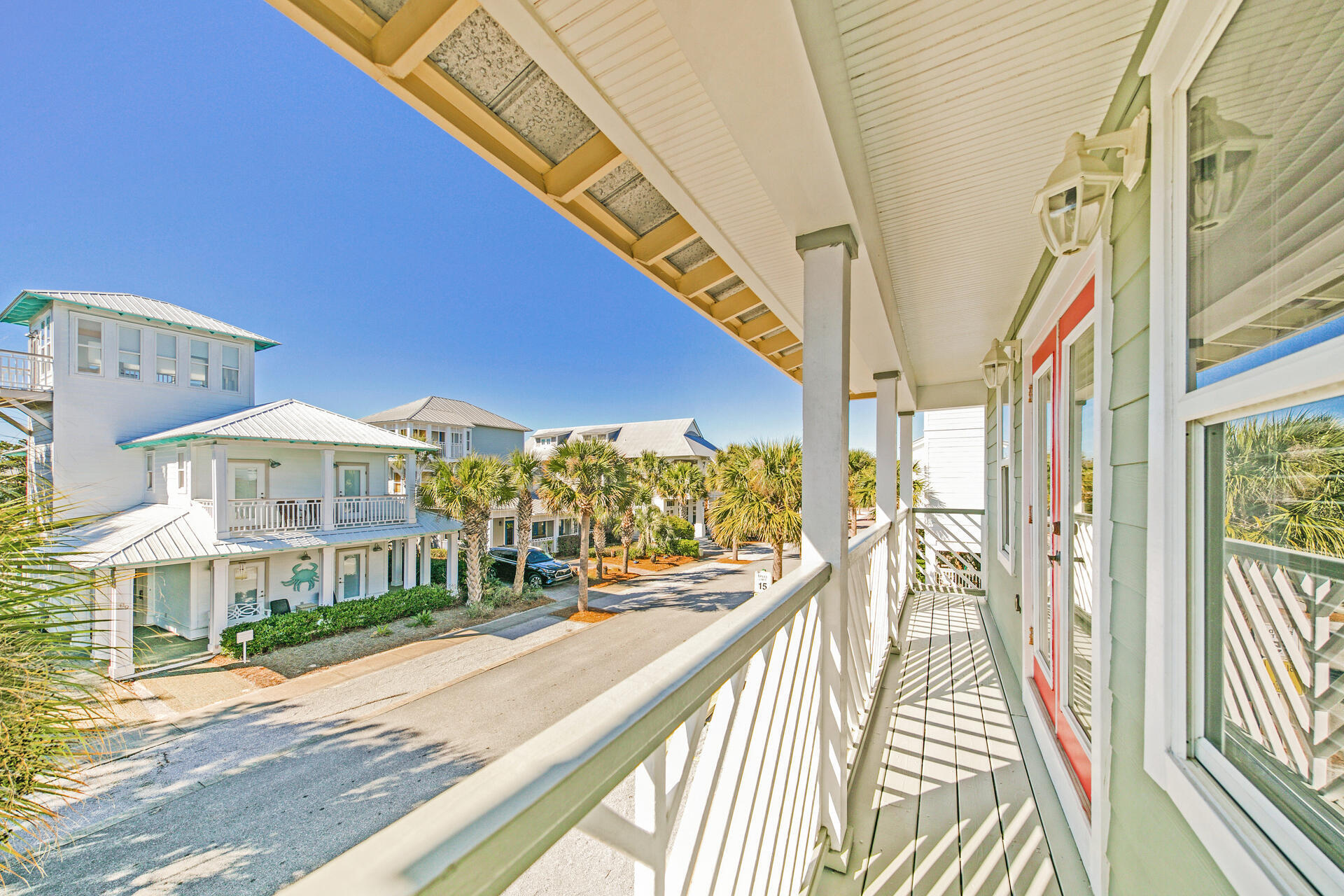 88 East Blue Crab Loop Panama City Beach, FL 32461 - Photo 27 of 55 a view of a balcony with a ocean view