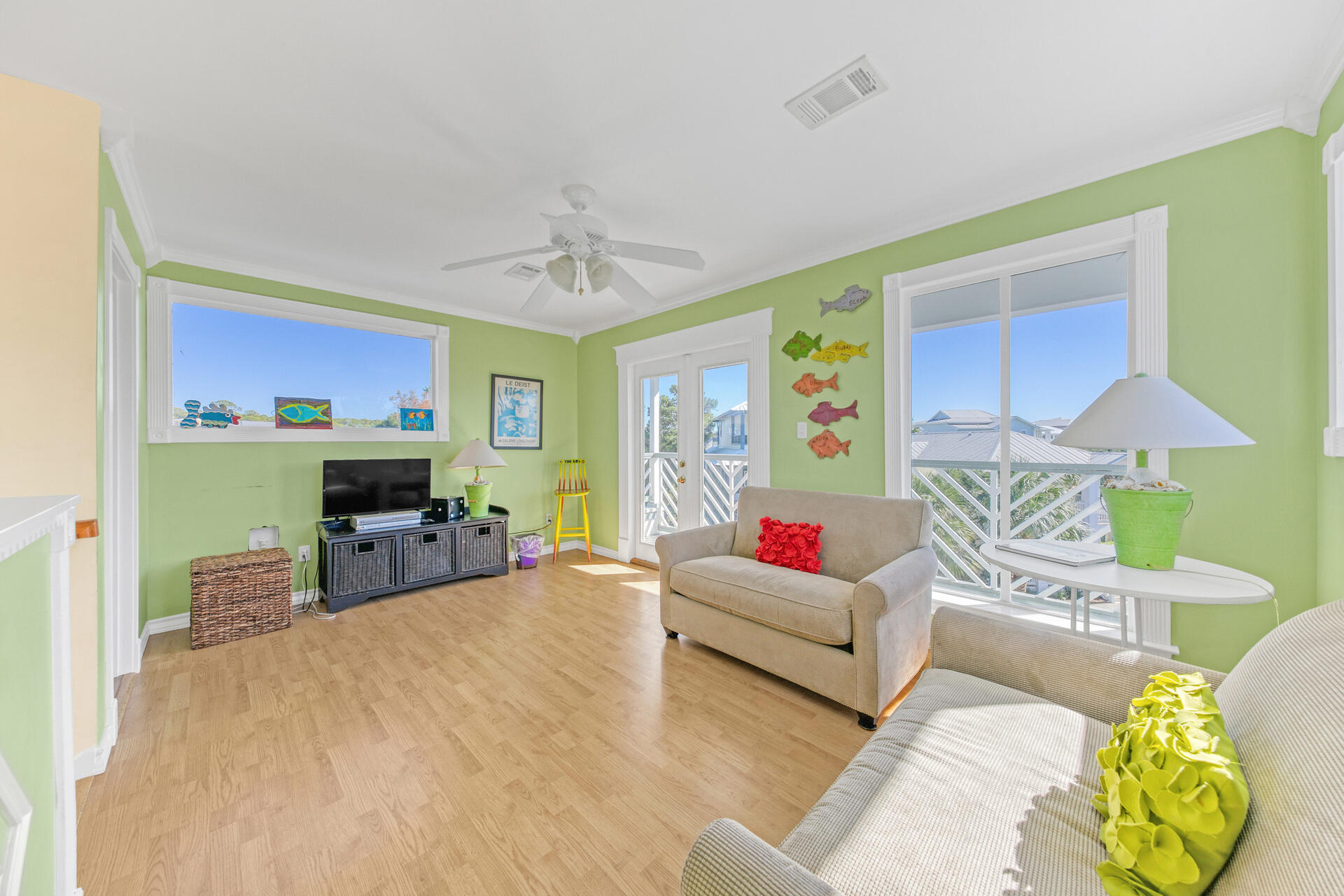 88 East Blue Crab Loop Panama City Beach, FL 32461 - Photo 30 of 55 a living room with furniture and a fireplace
