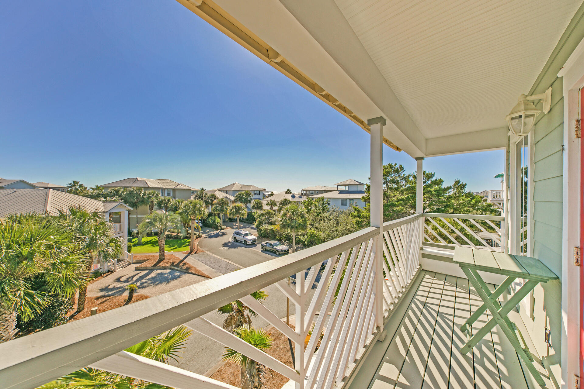 88 East Blue Crab Loop Panama City Beach, FL 32461 - Photo 34 of 55 a view of a balcony with furniture