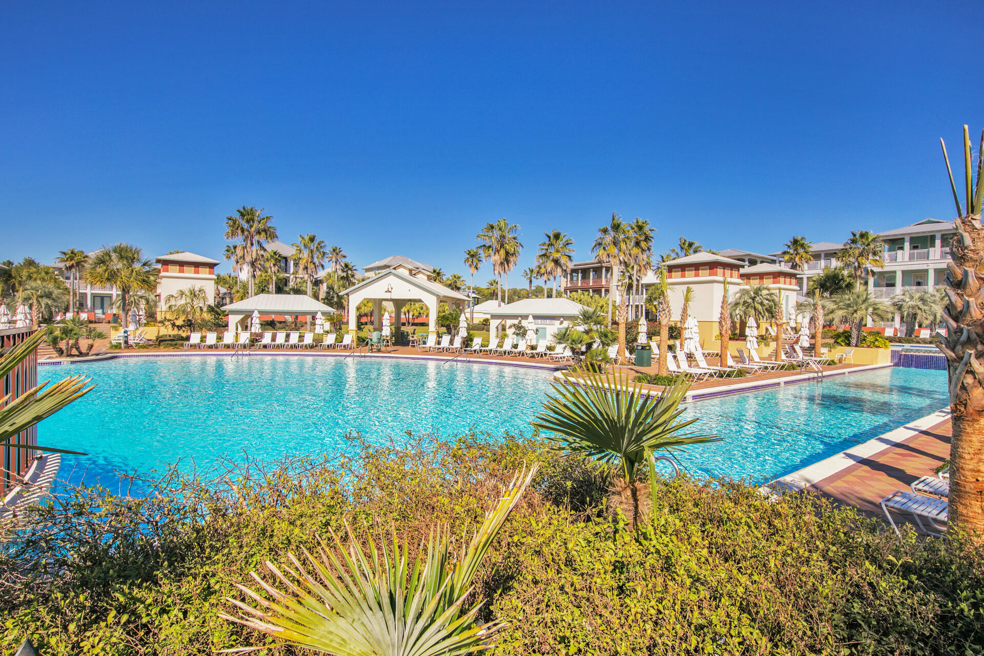 88 East Blue Crab Loop Panama City Beach, FL 32461 - Photo 49 of 55 a view of swimming pool with outdoor seating