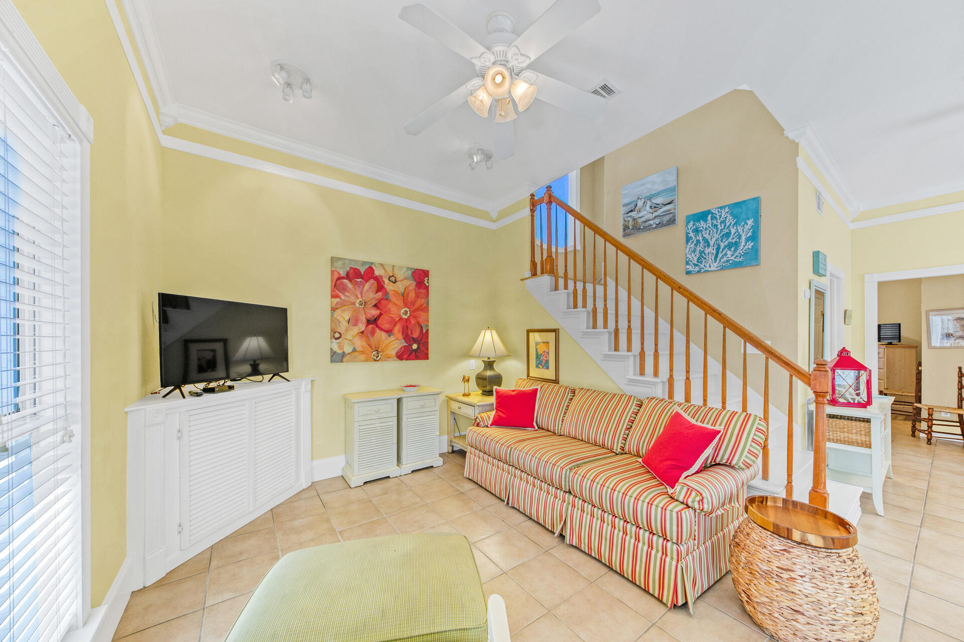 88 East Blue Crab Loop Panama City Beach, FL 32461 - Photo 7 of 55 a living room with furniture and a flat screen tv