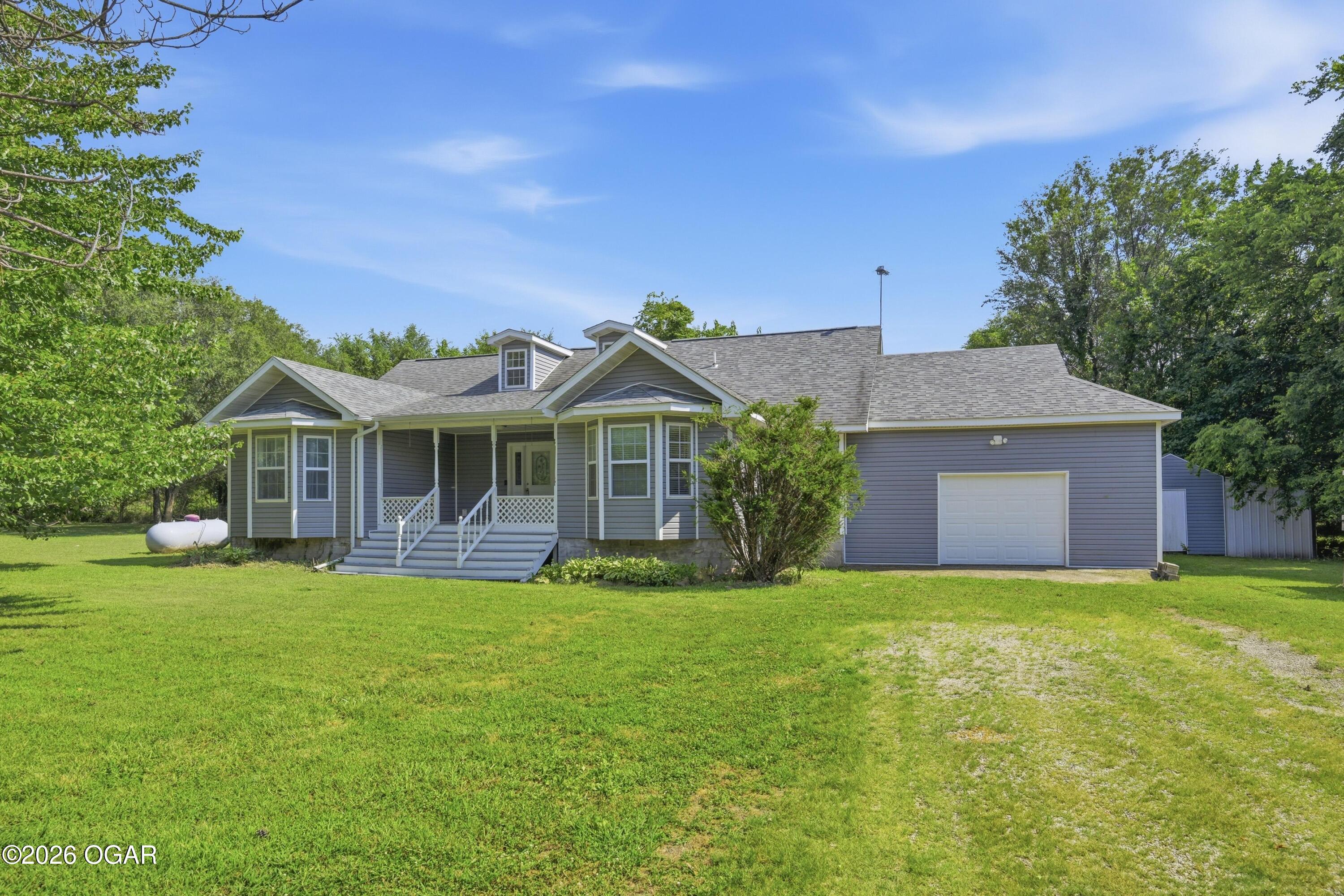 6060 Oak Road Carthage, MO 64836 - Photo 1 of 45 Gallery Image 1