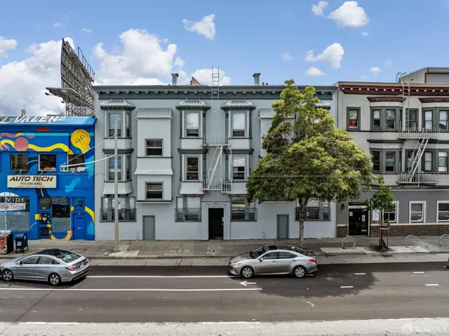 a car parked in front of a building