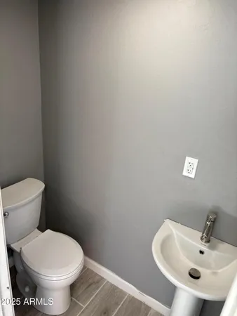 a bathroom with a sink and a toilet