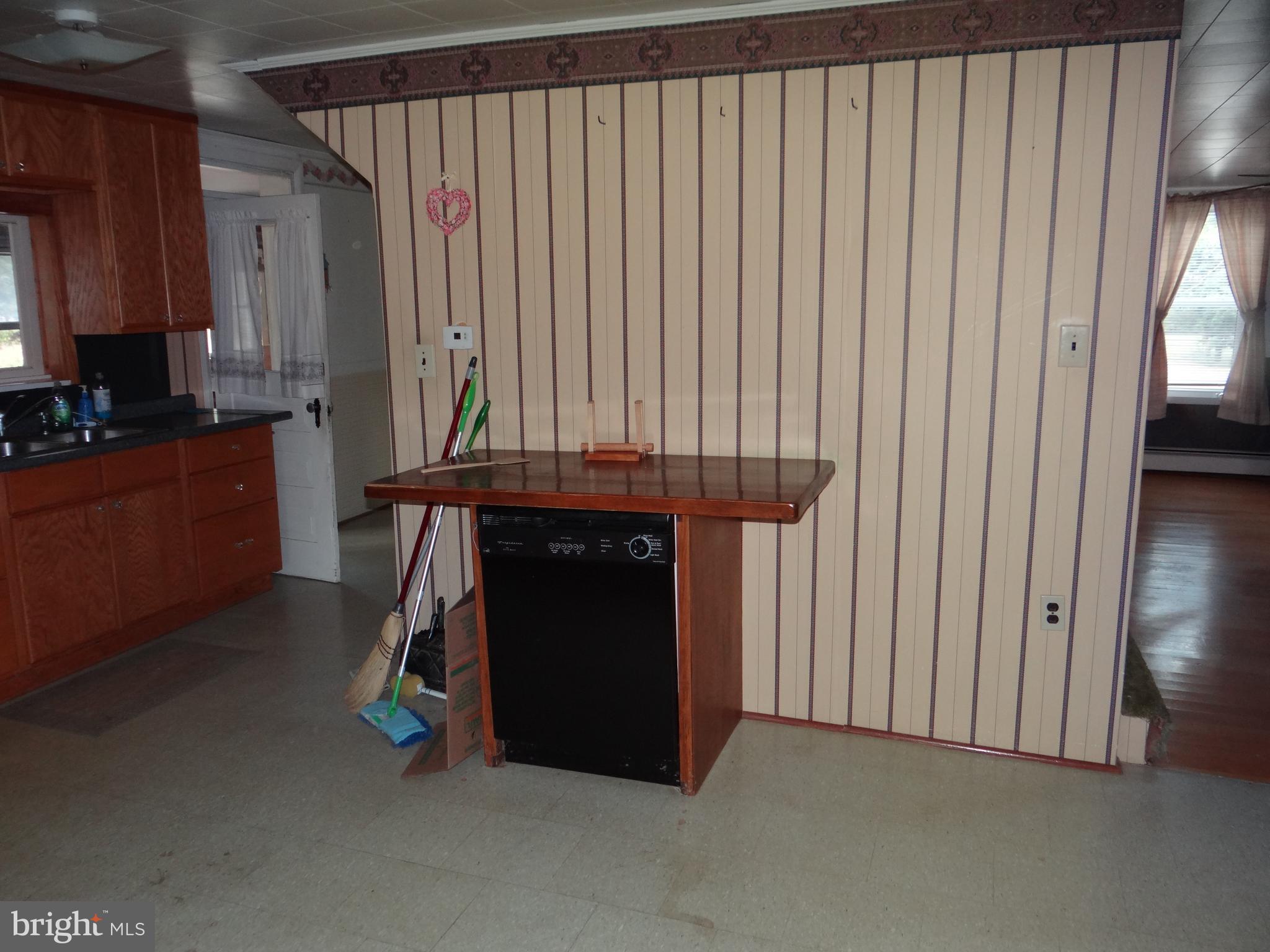 17247 Junkin Road Spring Run, PA 17262 - Photo 11 of 24 a view of a kitchen with furniture and a window