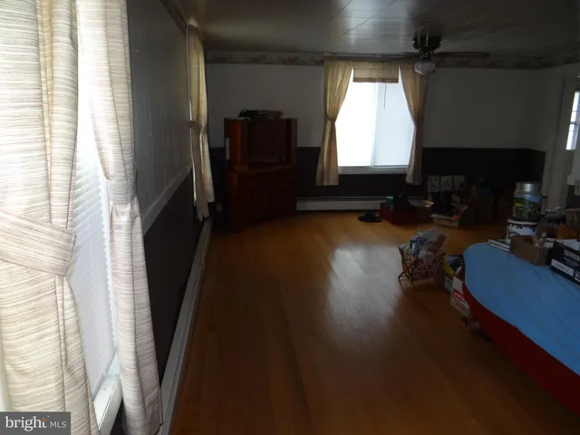 a room with furniture and a window