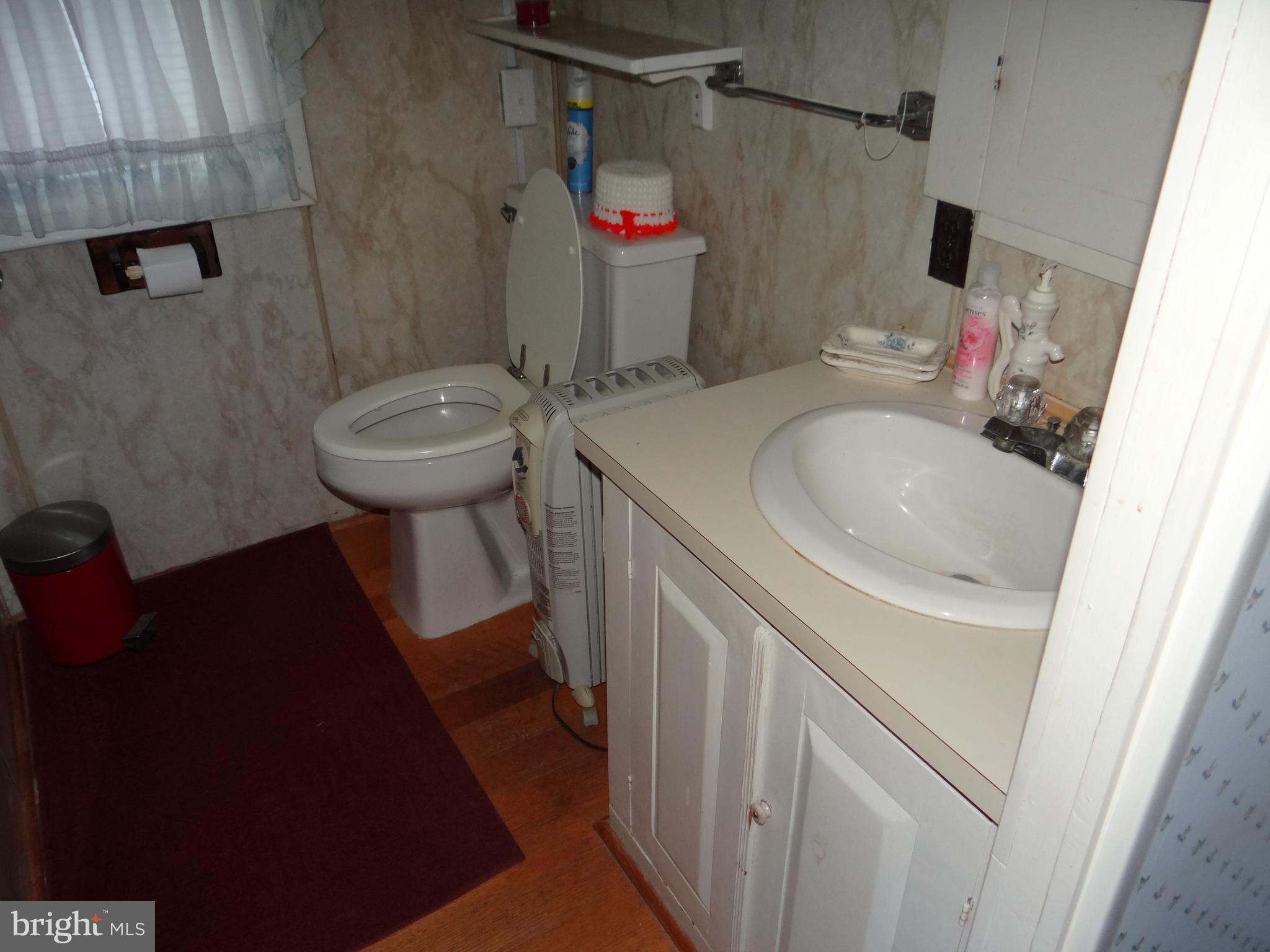 17247 Junkin Road Spring Run, PA 17262 - Photo 15 of 24 a bathroom with a sink toilet and shower