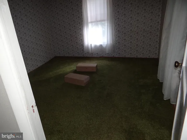 a bathroom with a toilet a sink and a bathtub