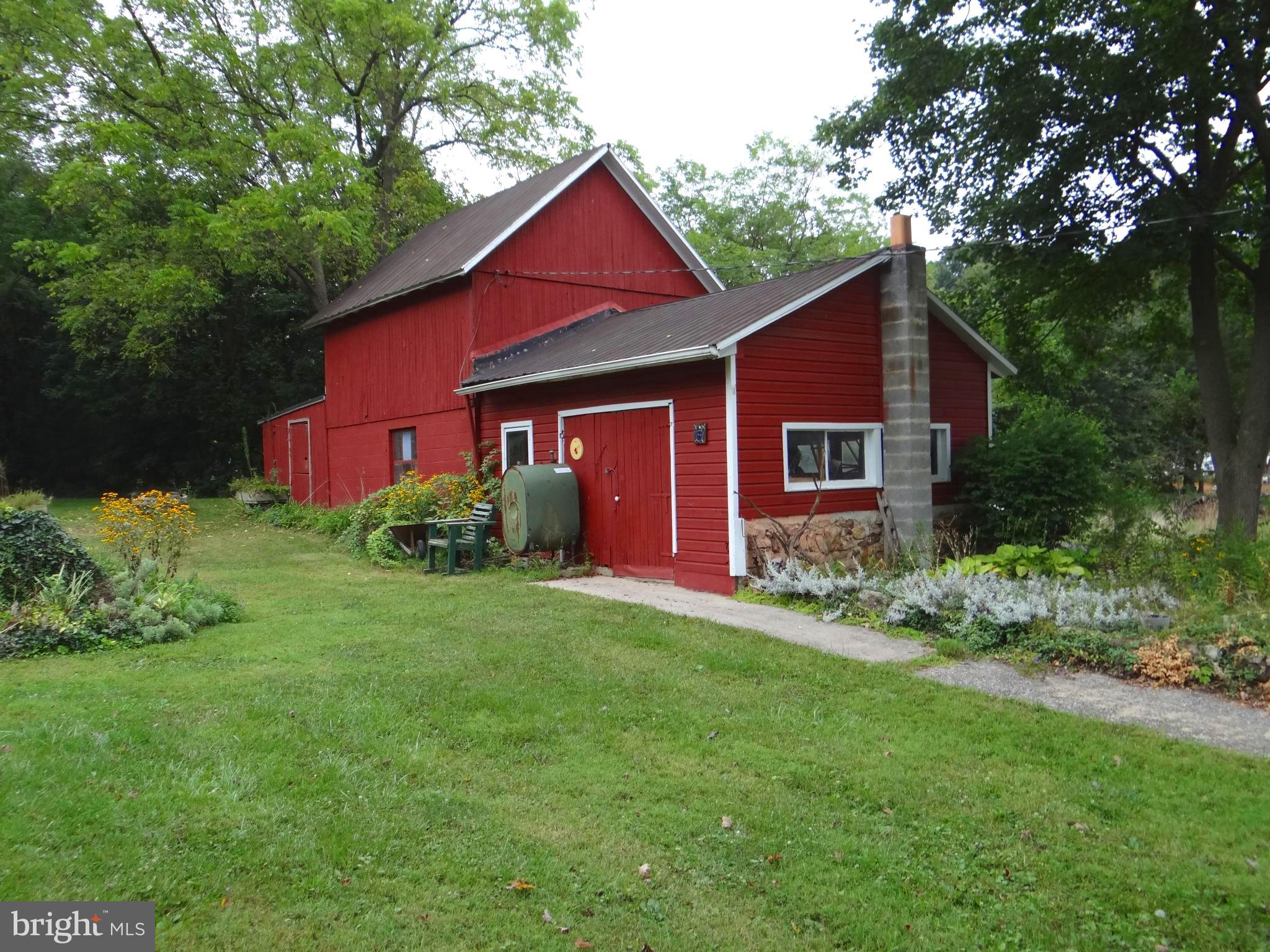17247 Junkin Road Spring Run, PA 17262 - Photo 6 of 24 a front view of a house with garden