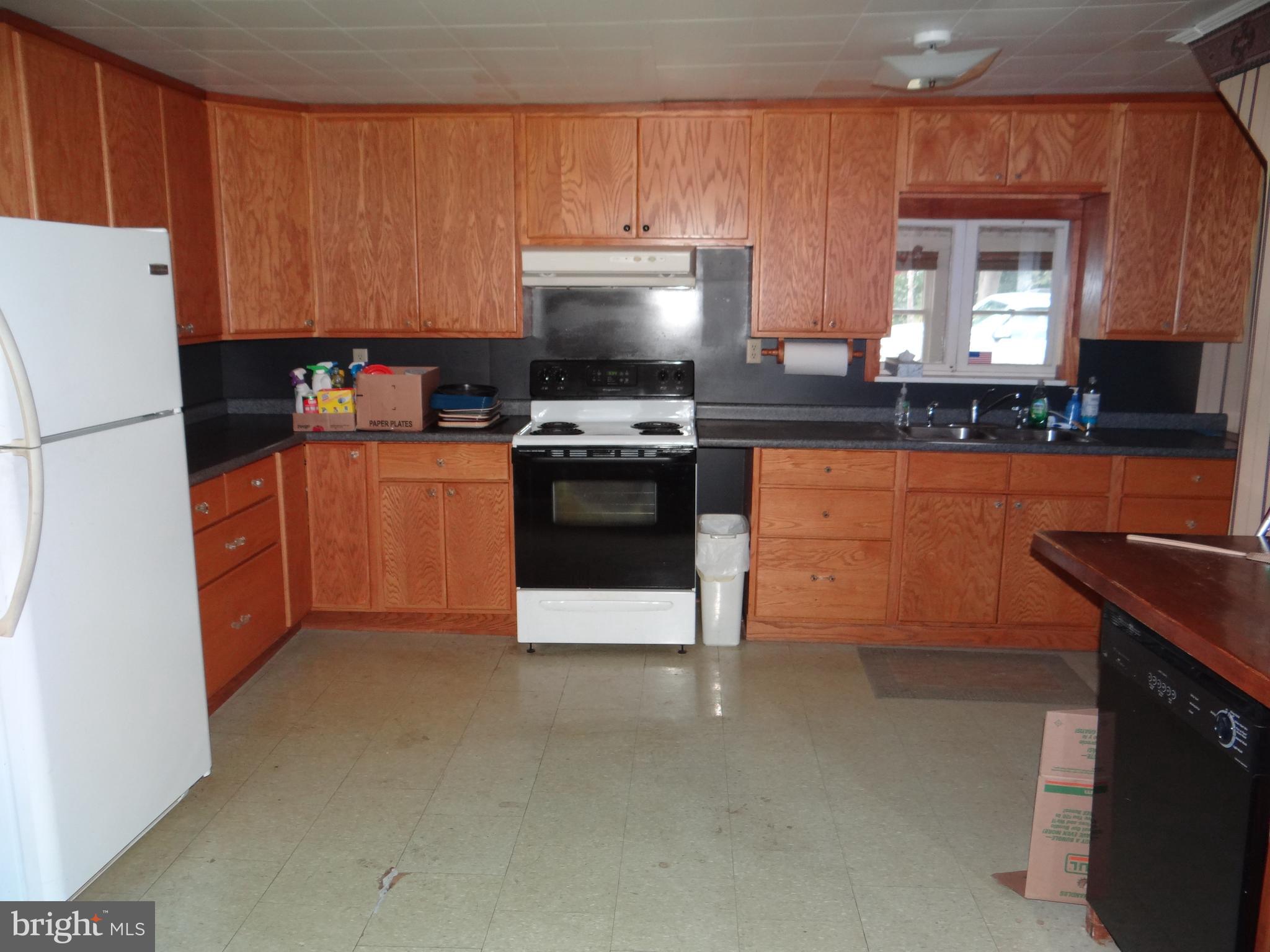 17247 Junkin Road Spring Run, PA 17262 - Photo 9 of 24 a kitchen with stainless steel appliances a stove a sink and a refrigerator