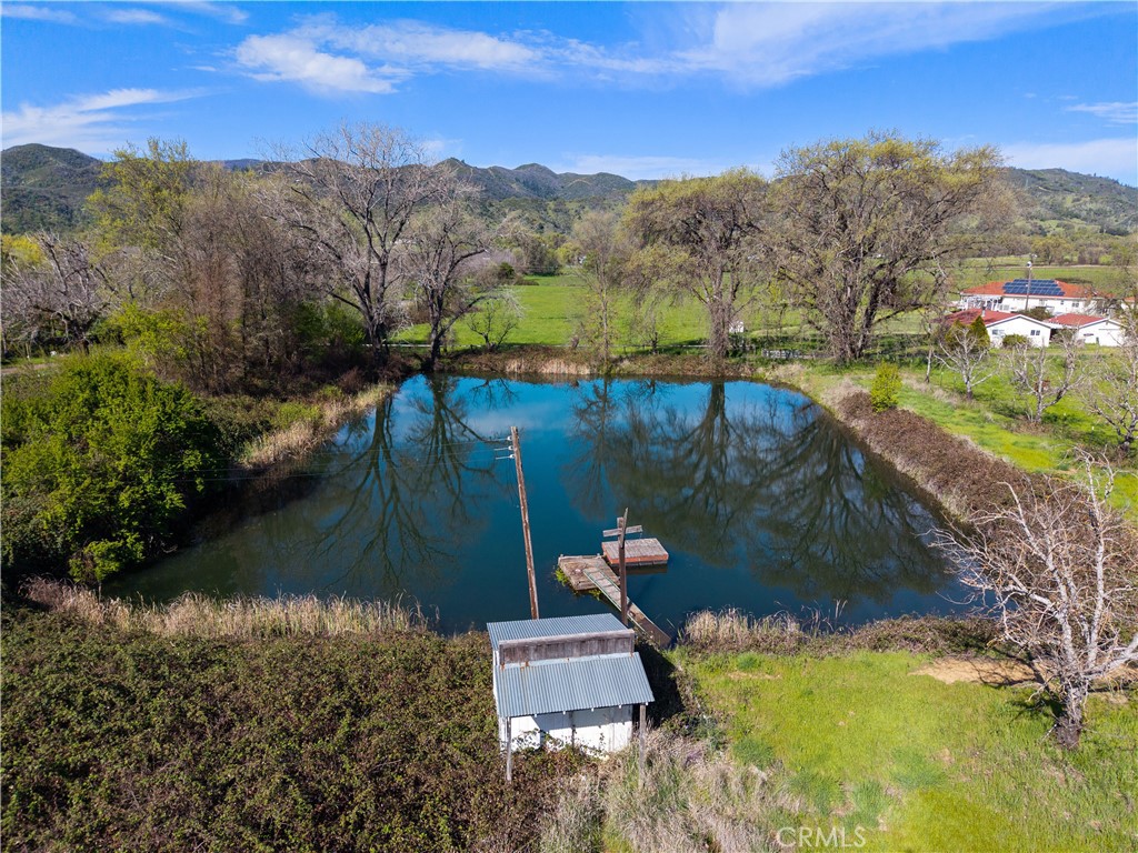10950 Bachelor Valley Road Upper Lake, CA 95493 - Photo 22 of 28 a view of a lake from a balcony