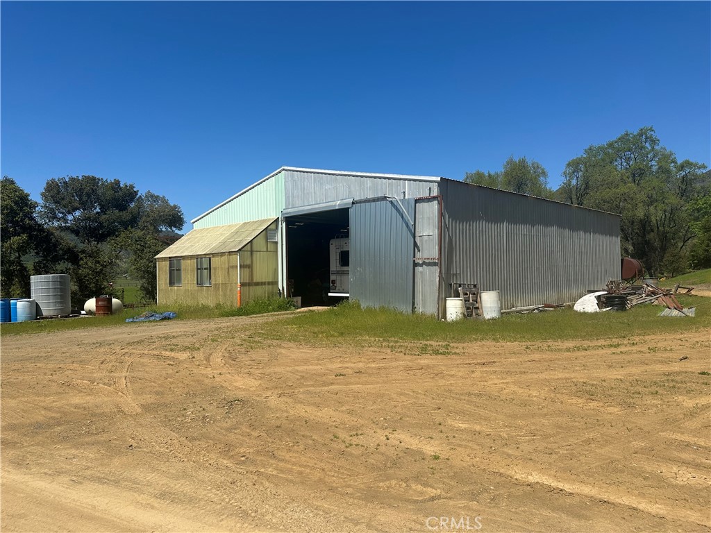 10950 Bachelor Valley Road Upper Lake, CA 95493 - Photo 27 of 28 a front view of a house with a yard