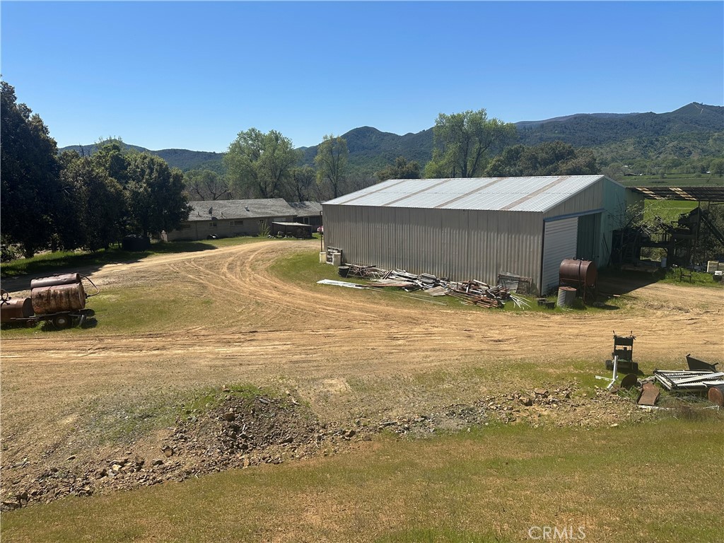 10950 Bachelor Valley Road Upper Lake, CA 95493 - Photo 28 of 28 a view of a terrace with a lake view