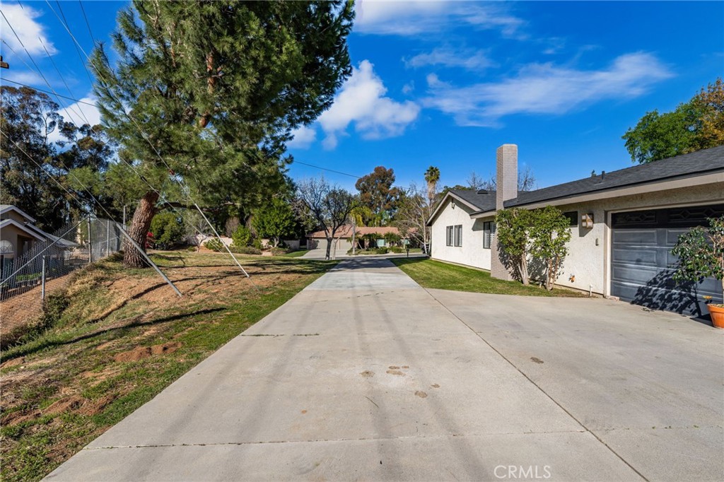 1274 Muirfield Road Riverside, CA 92506 - Photo 32 of 48 a view of the house with basketball court