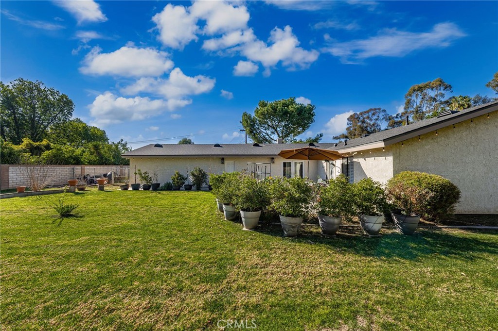 1274 Muirfield Road Riverside, CA 92506 - Photo 36 of 48 a front view of a house with a yard