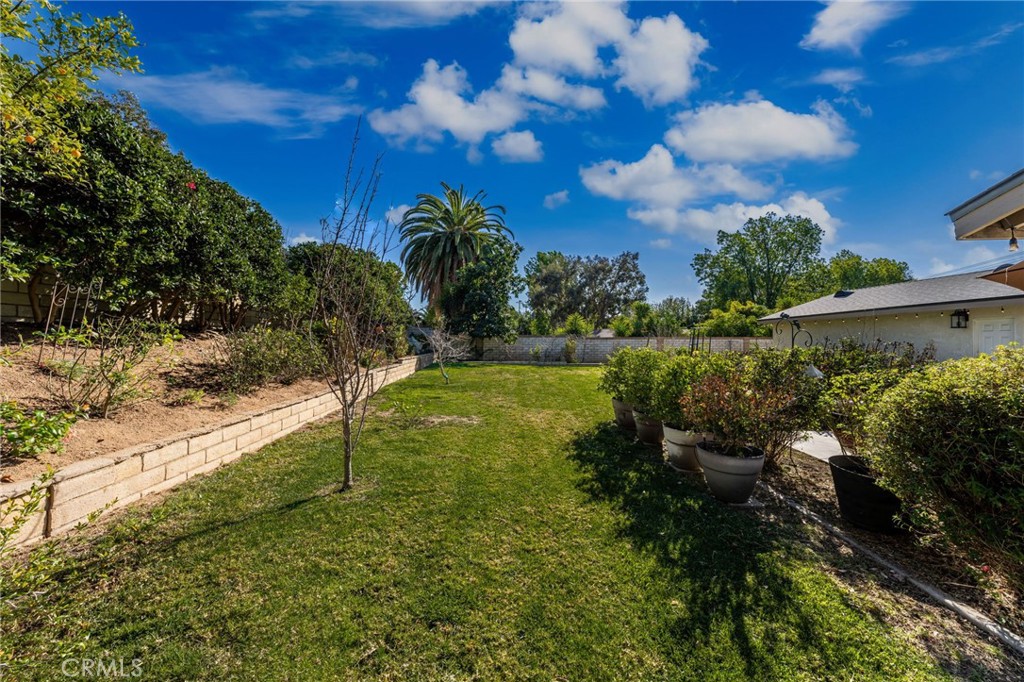 1274 Muirfield Road Riverside, CA 92506 - Photo 37 of 48 a view of a street with a yard