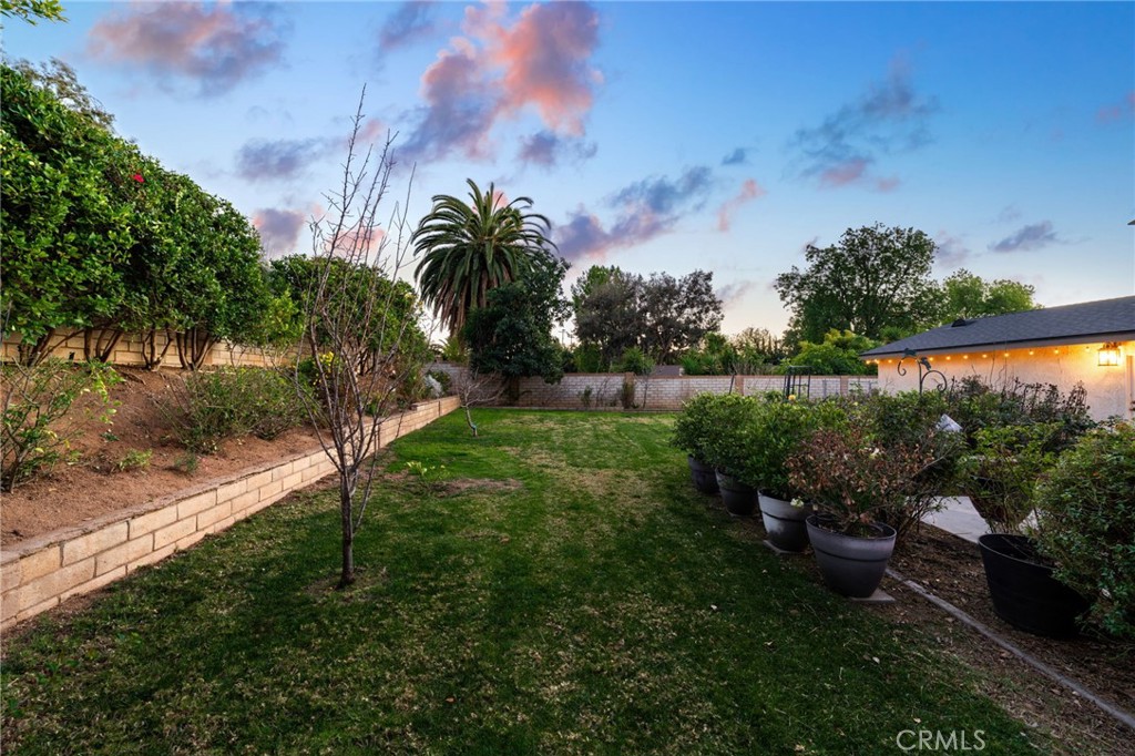 1274 Muirfield Road Riverside, CA 92506 - Photo 45 of 48 a backyard of a house with lots of green space