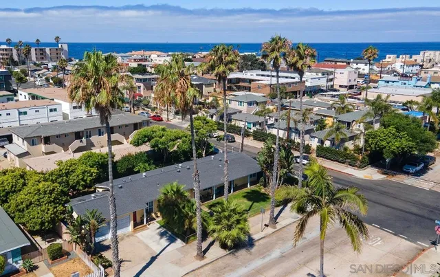 an aerial view of beach and ocean