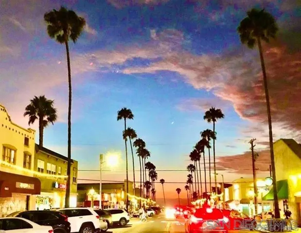 a kitchen with a sink and a stove top oven