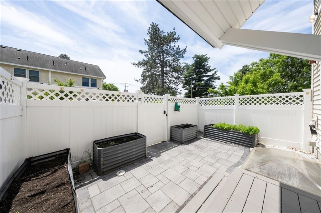 6 Bates Street, Unit A Devens, MA 01434 - Photo 35 of 41 a view of a roof deck with potted plants