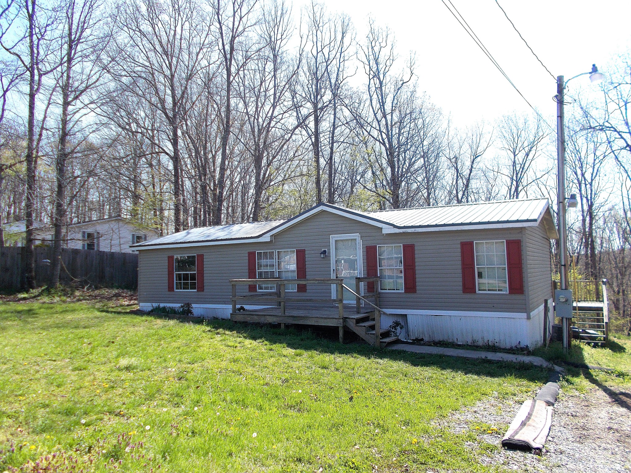 5251 Morgan Creek Road Centerville, TN 37033 - Photo 2 of 31 a view of a house with a yard chairs and a table and chairs