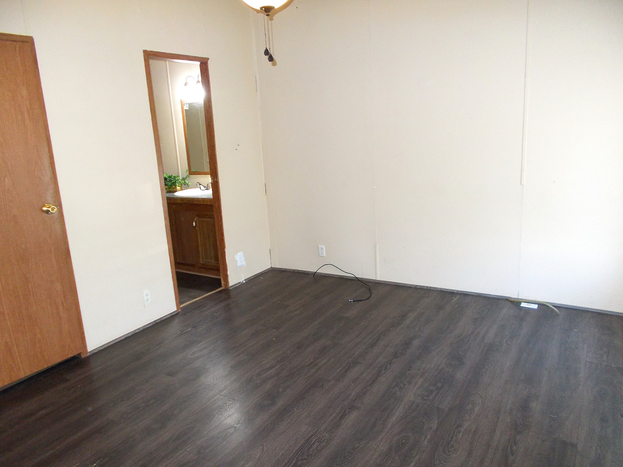 5251 Morgan Creek Road Centerville, TN 37033 - Photo 19 of 31 an empty room with wooden floor
