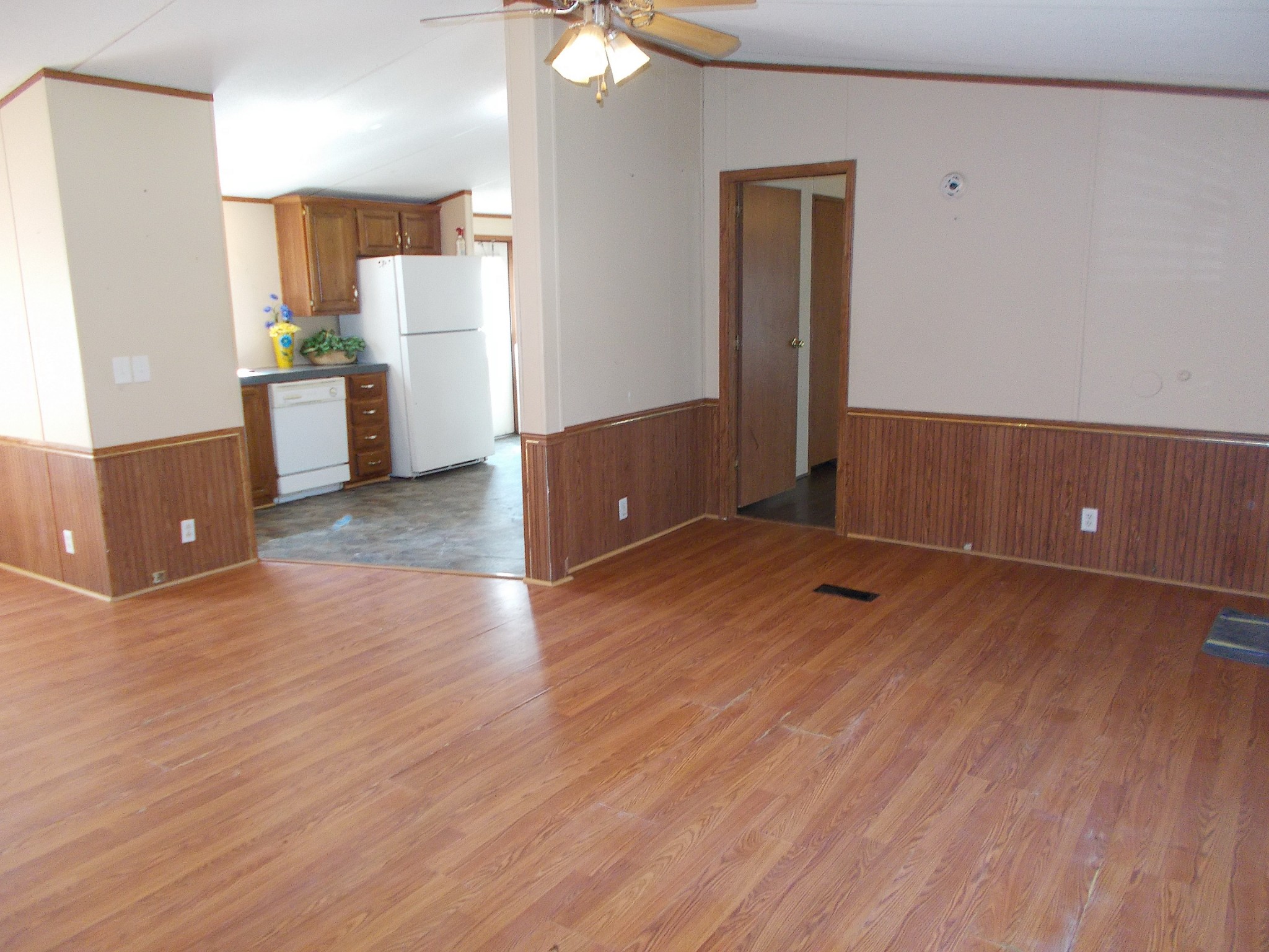 5251 Morgan Creek Road Centerville, TN 37033 - Photo 8 of 31 an empty room with wooden floor and cabinet