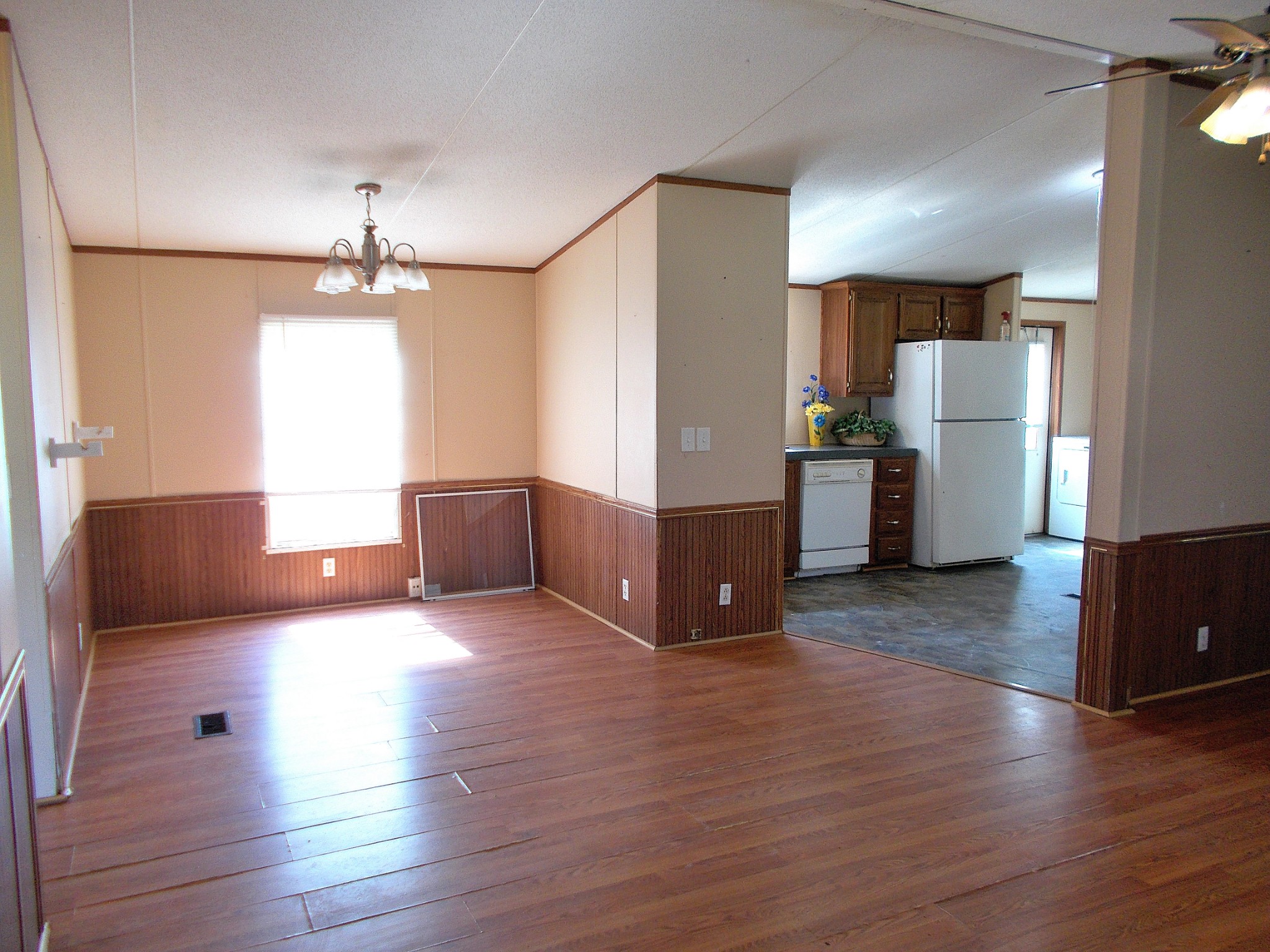 5251 Morgan Creek Road Centerville, TN 37033 - Photo 10 of 31 a view of a kitchen with furniture and wooden floor