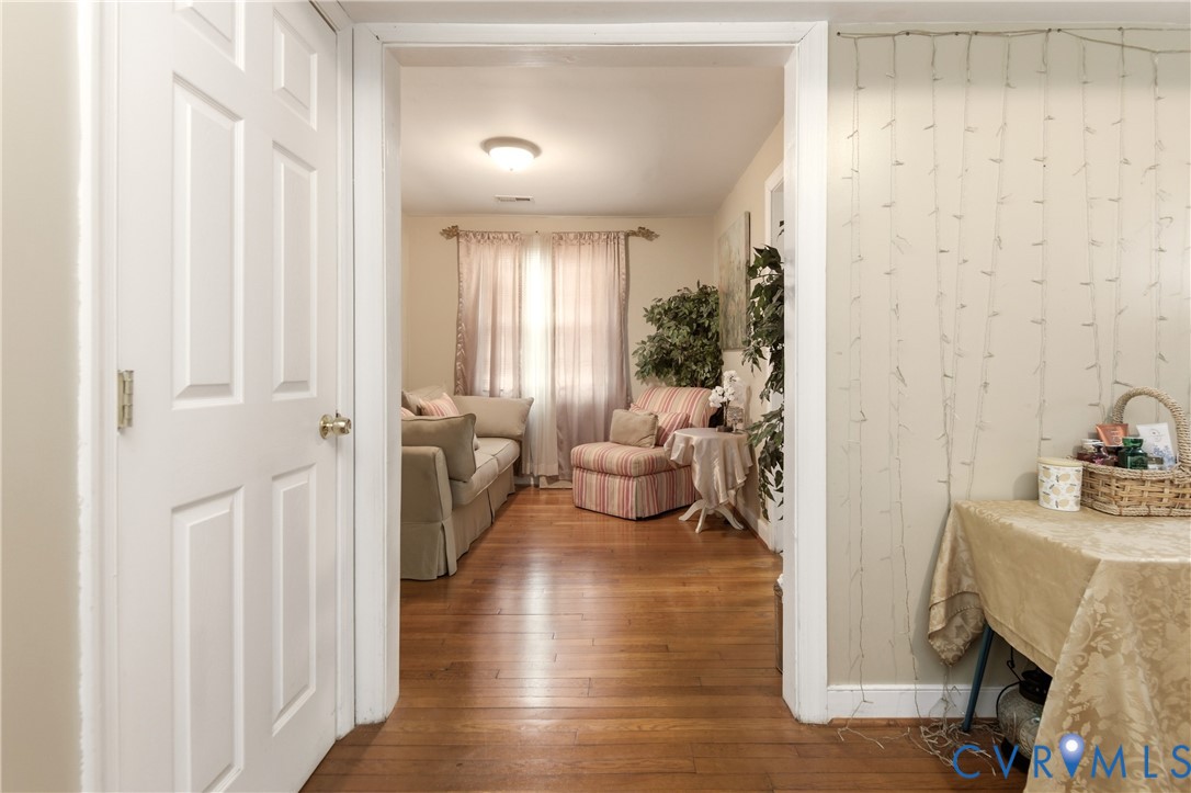 1311 Williamsburg Road Richmond, VA 23231 - Photo 6 of 32 a living room with furniture and a fireplace