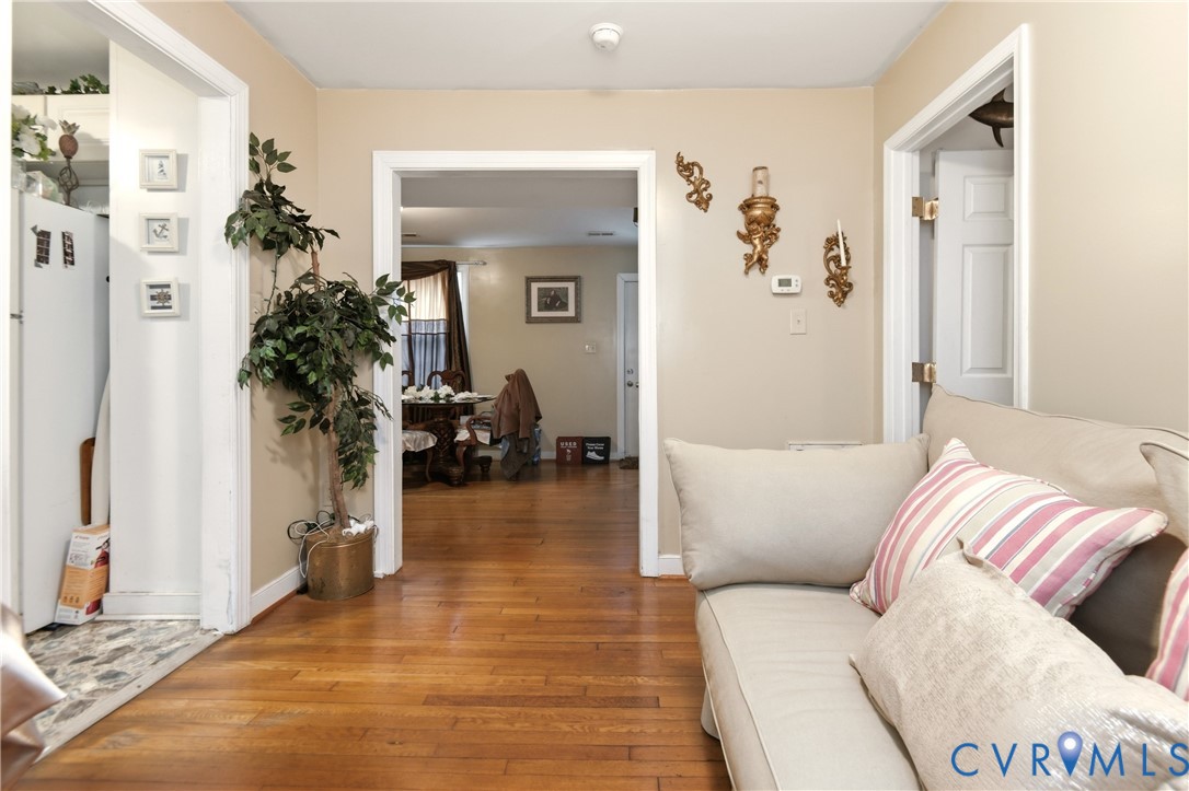 1311 Williamsburg Road Richmond, VA 23231 - Photo 8 of 32 a living room with furniture and a potted plant