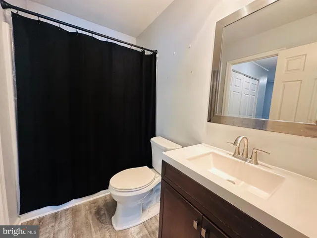a bathroom with a sink and a toilet