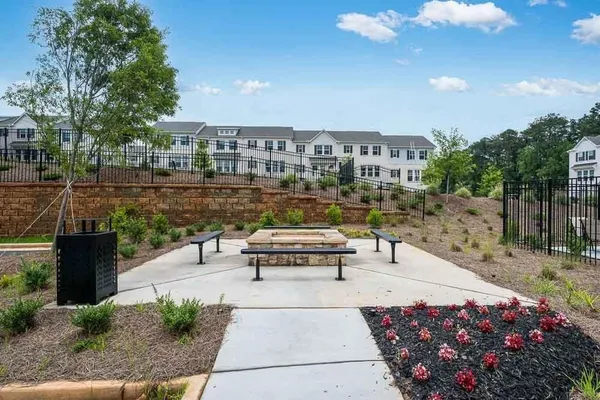an aerial view of a house with outdoor space