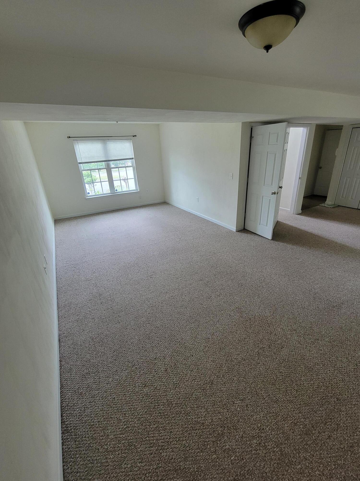 1122 Updike Road Roanoke, VA 24014 - Photo 8 of 14 a view of an empty room with a window