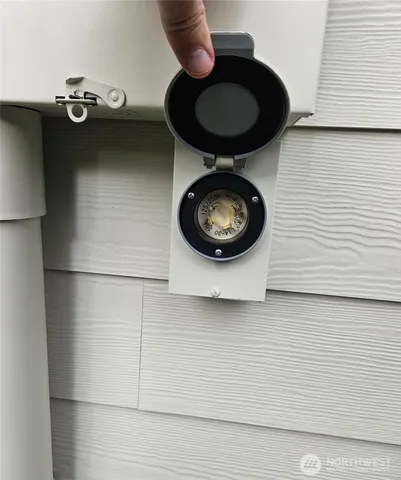 a stove top oven sitting inside of a kitchen