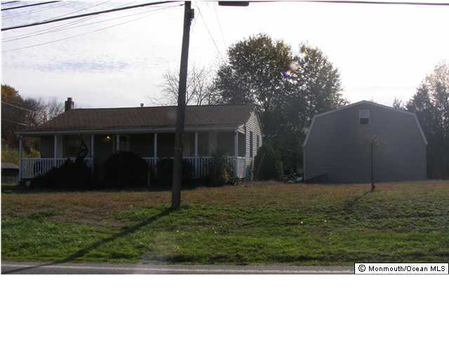 813 Monmouth Road Cream Ridge, NJ 08514 - Photo 1 of 1 a view of a backyard of the house