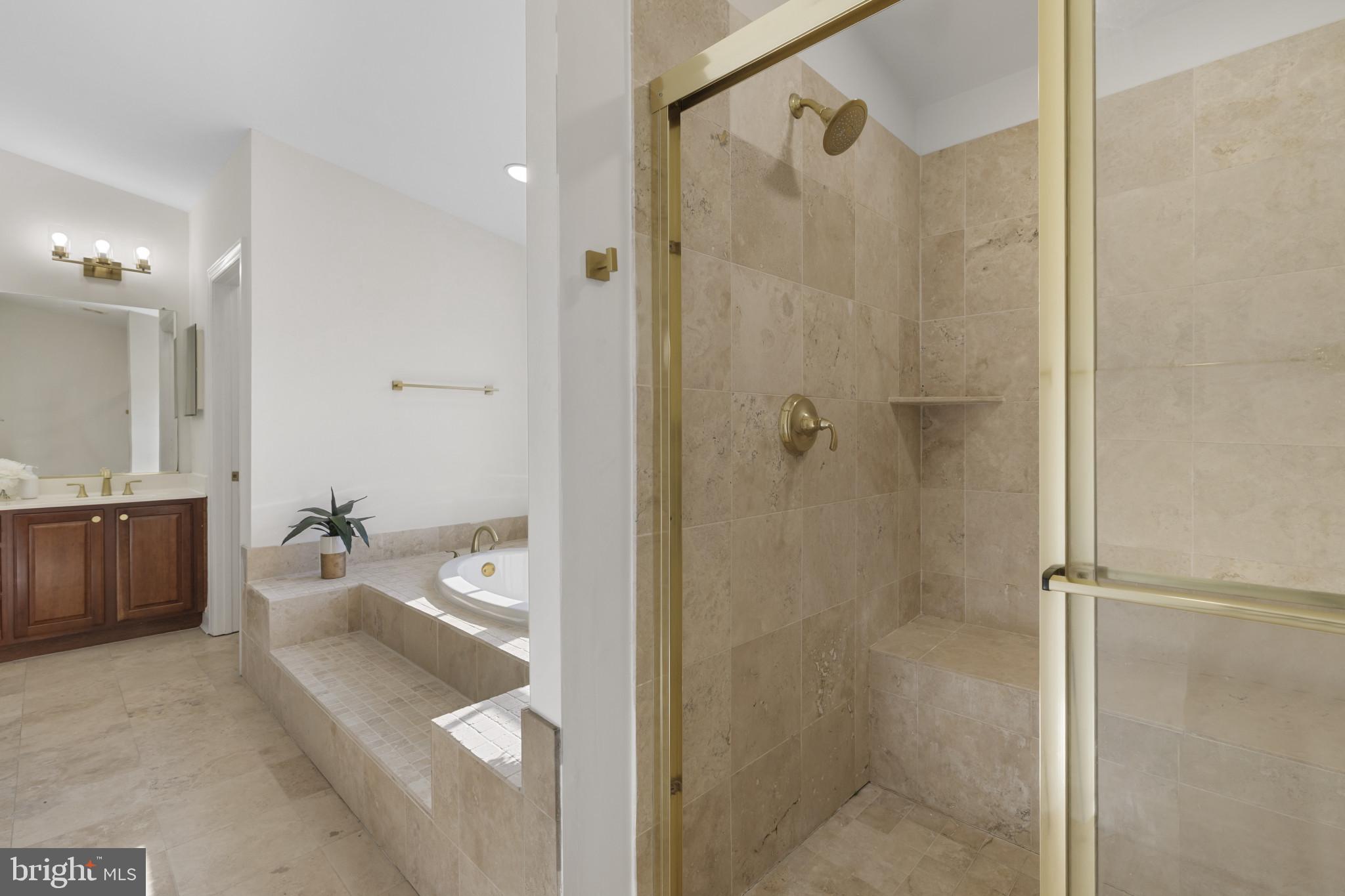 1256 Dockside Circle Baltimore, MD 21224 - Photo 16 of 41 a bathroom with a tub shower vanity and a sink