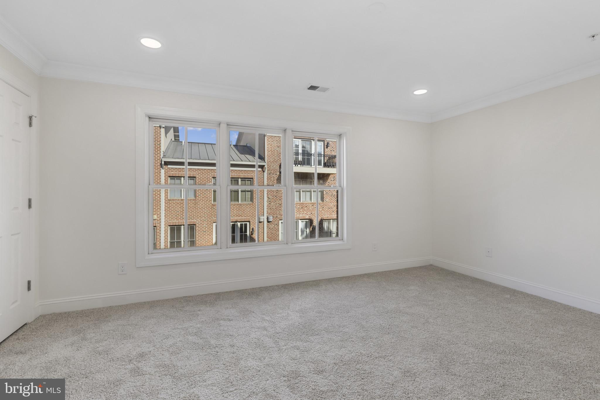 1256 Dockside Circle Baltimore, MD 21224 - Photo 19 of 41 a view of empty room with windows