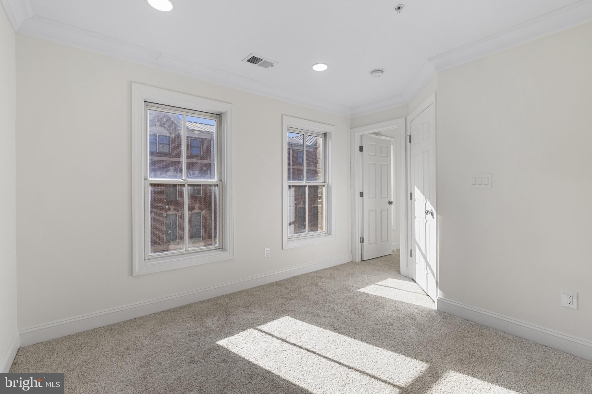 1256 Dockside Circle Baltimore, MD 21224 - Photo 20 of 41 an empty room with windows