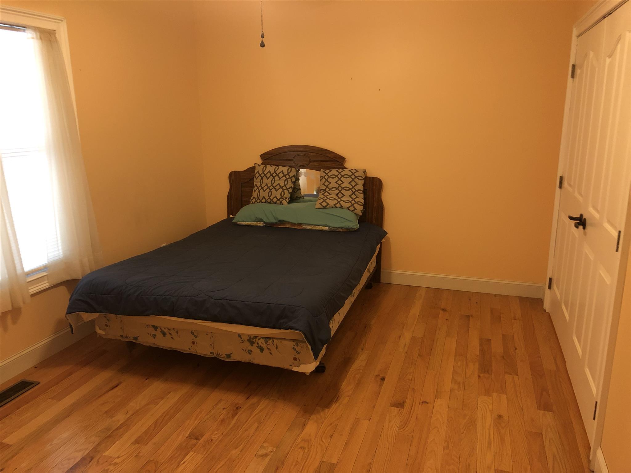 374 Eagle Lake Road Coalmont, TN 37313 - Photo 23 of 28 a bedroom with a bed and a window