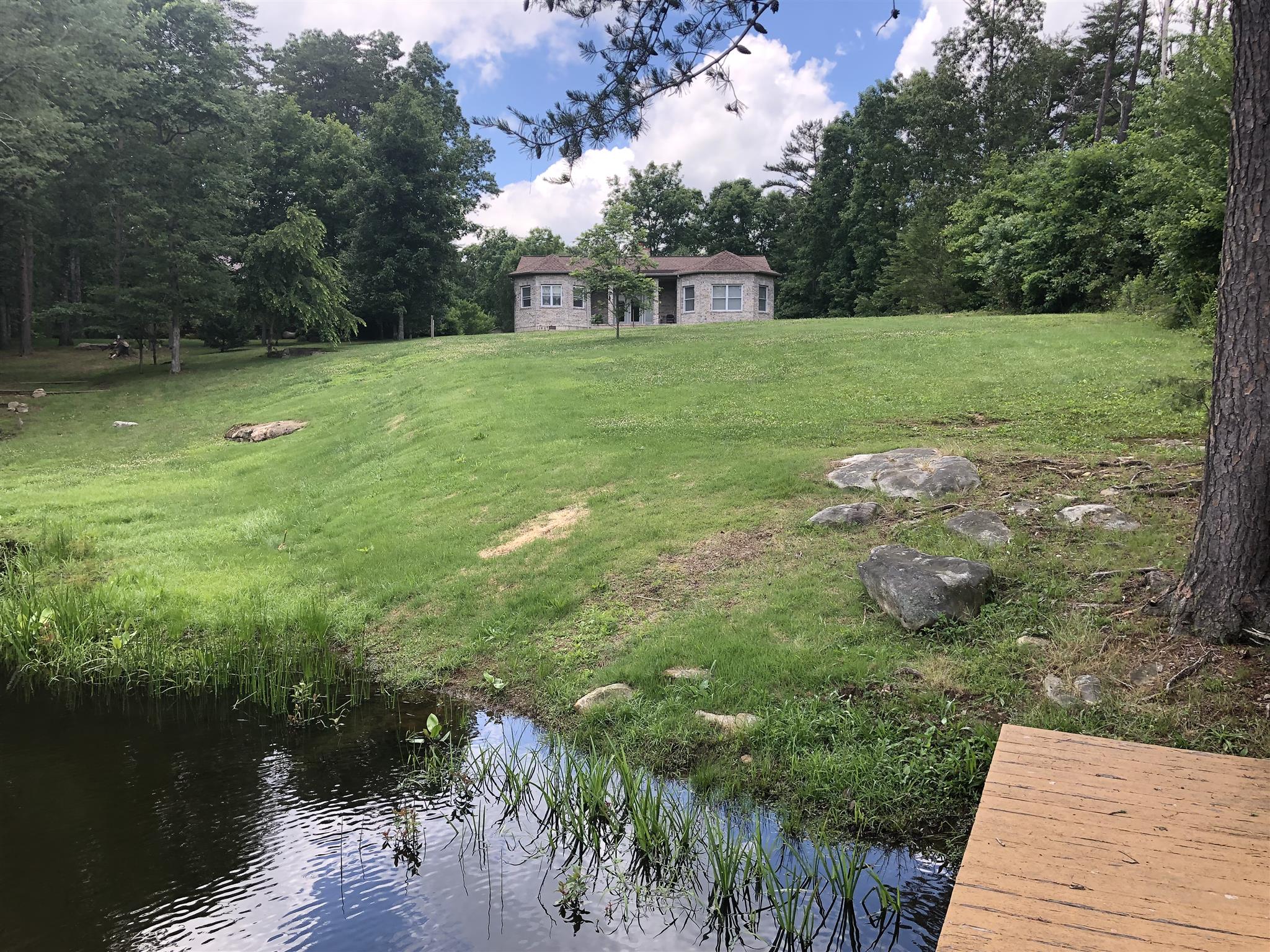 374 Eagle Lake Road Coalmont, TN 37313 - Photo 9 of 28 a view of a backyard