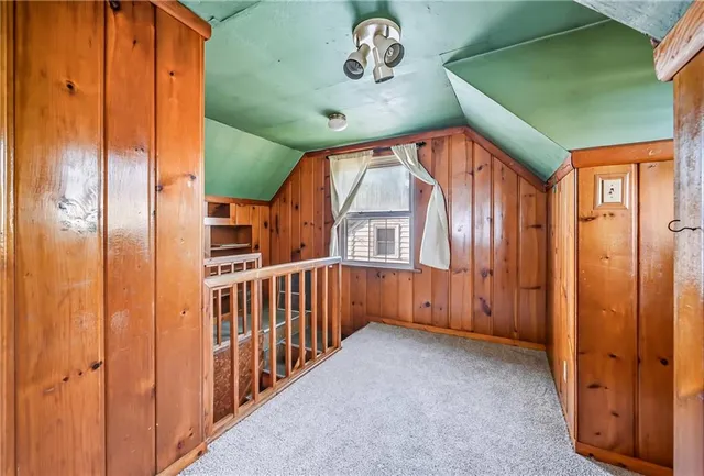a view of a bathroom with a shower and a sink