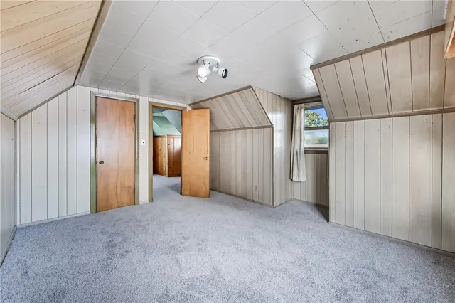 a bathroom with a shower and a sink