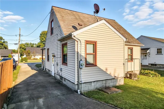a front view of a house with a garage