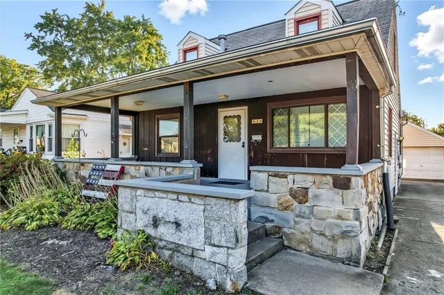 a view of house with outdoor seating space