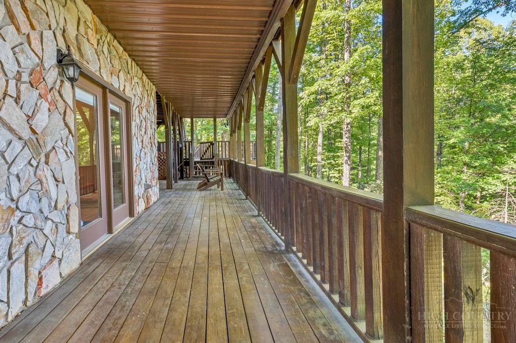 2229 Elk Ridge Road Ferguson, NC 28624 - Photo 41 of 42 a view of balcony with wooden floor